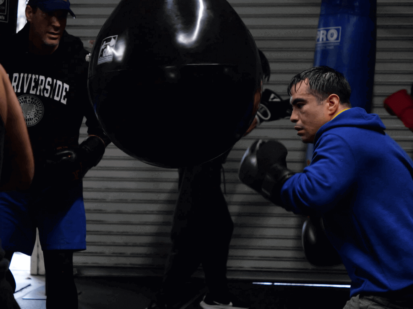 Joab Corey punching boxing bag