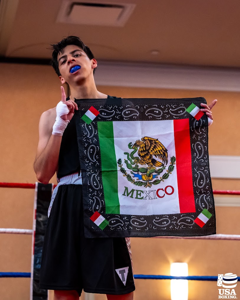 USIBA boxer holding Mexican flag